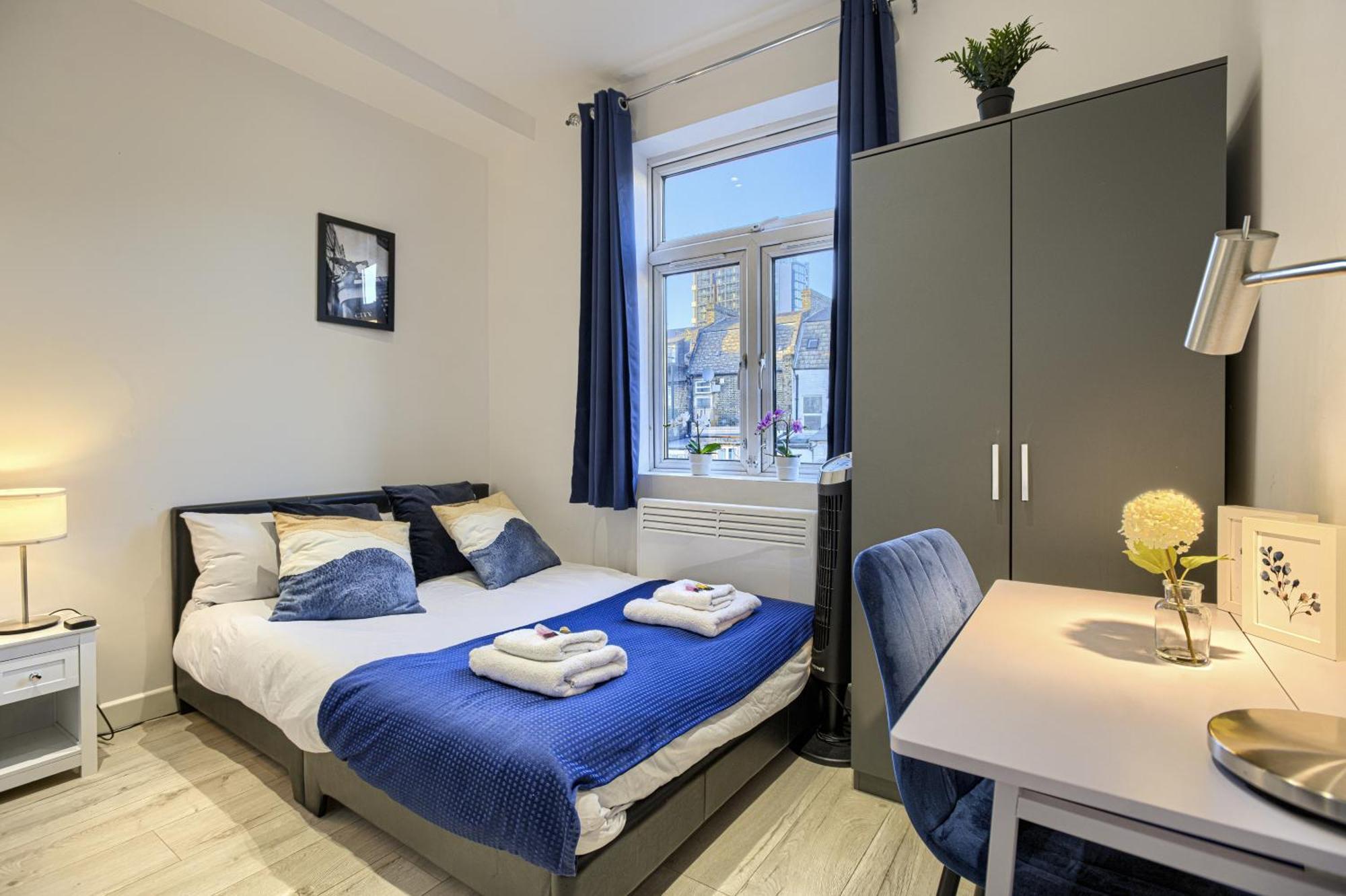 The Finsbury Deluxe Apartments London Szoba fotó