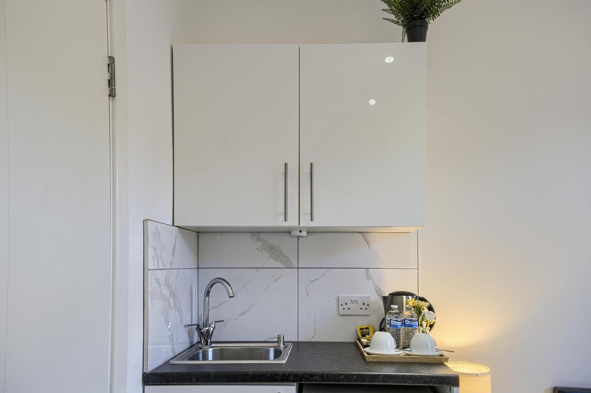 The Finsbury Deluxe Apartments London Szoba fotó