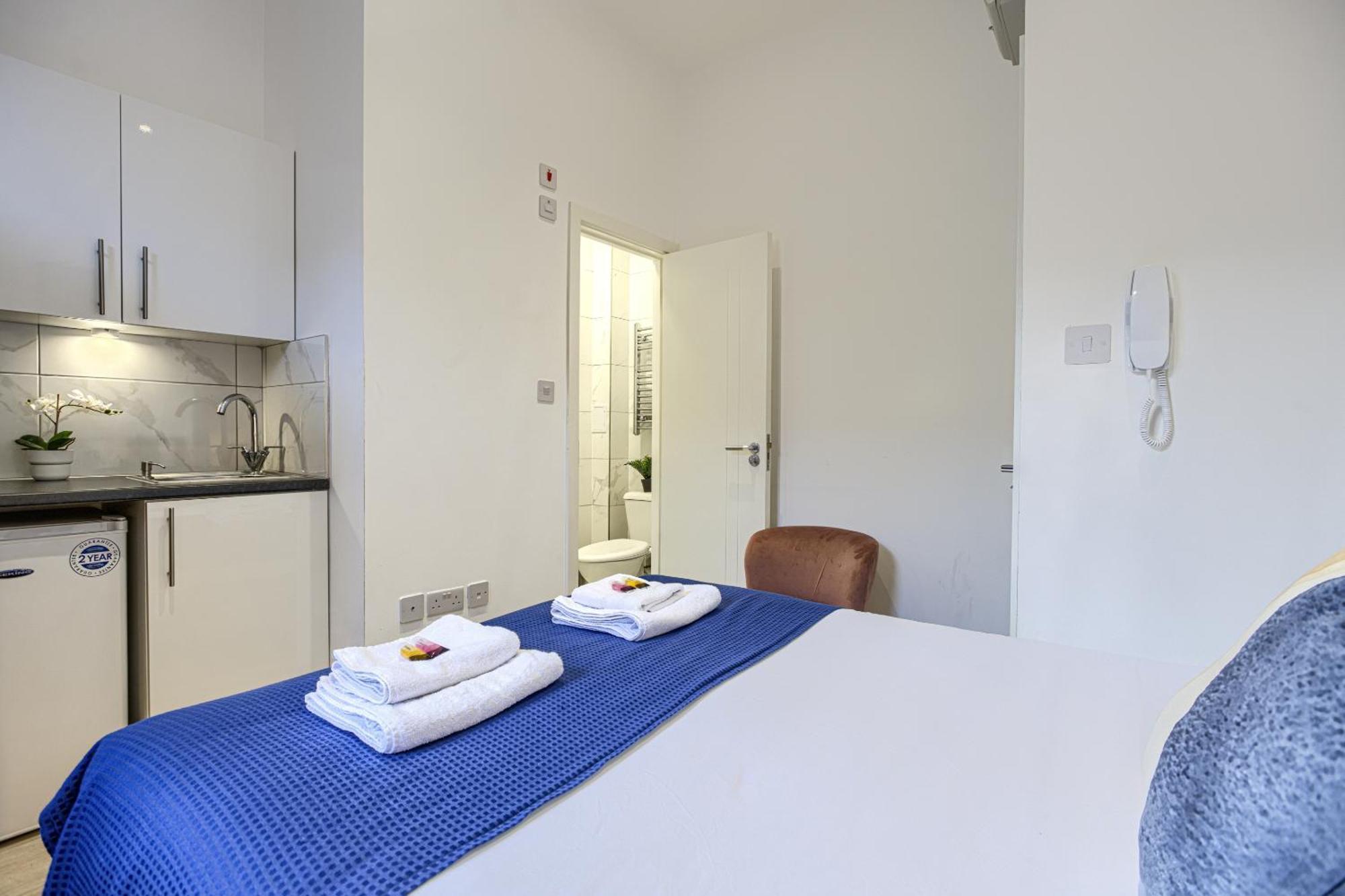 The Finsbury Deluxe Apartments London Szoba fotó