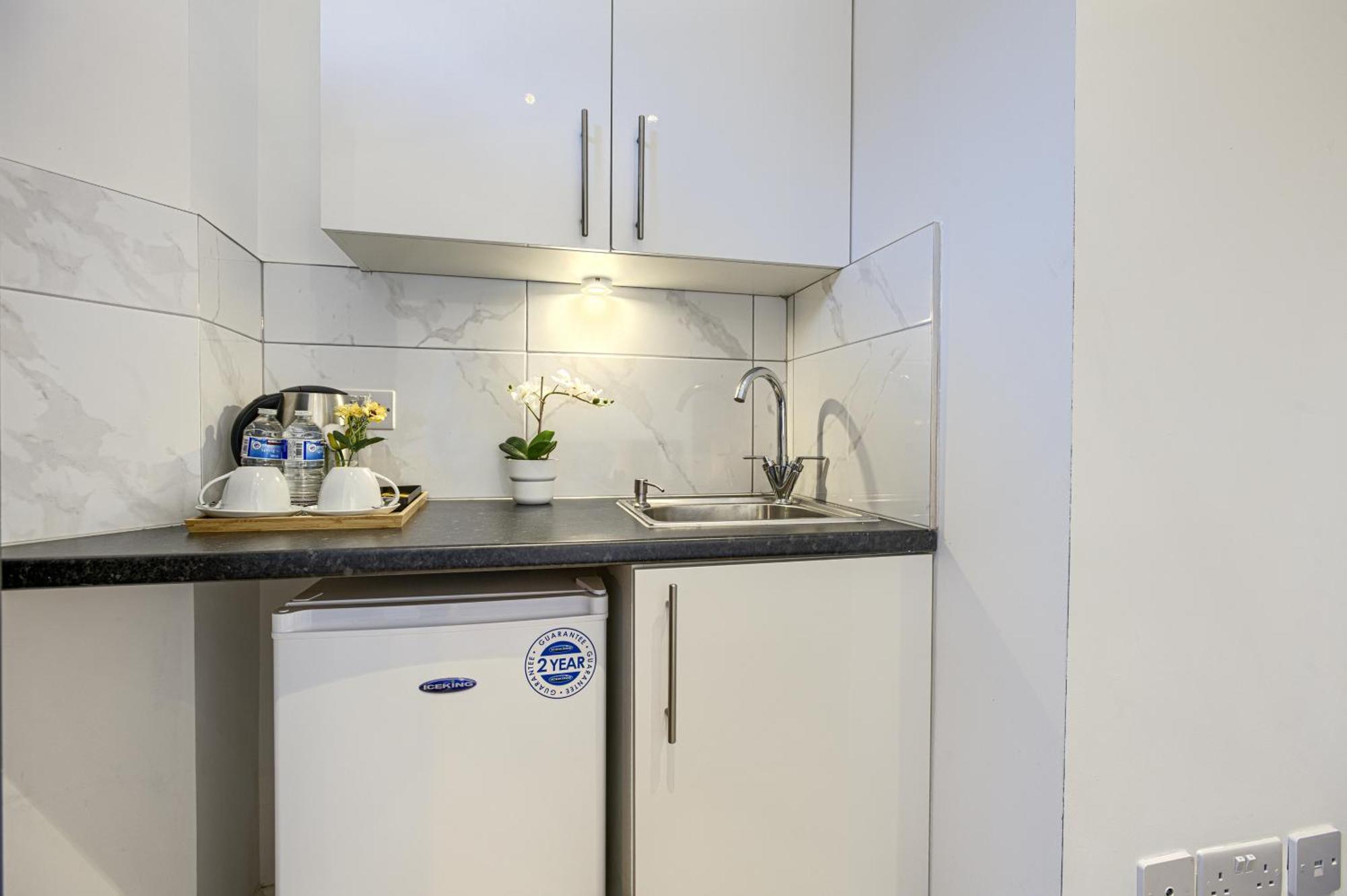 The Finsbury Deluxe Apartments London Szoba fotó