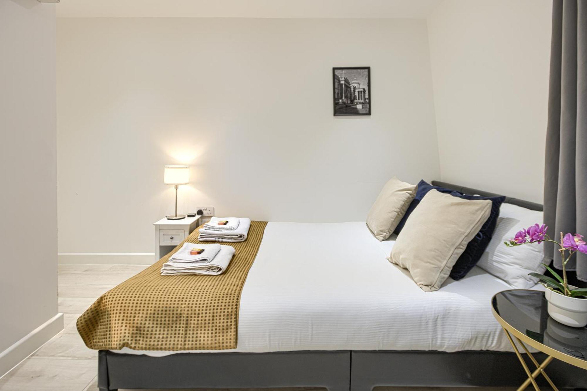 The Finsbury Deluxe Apartments London Szoba fotó