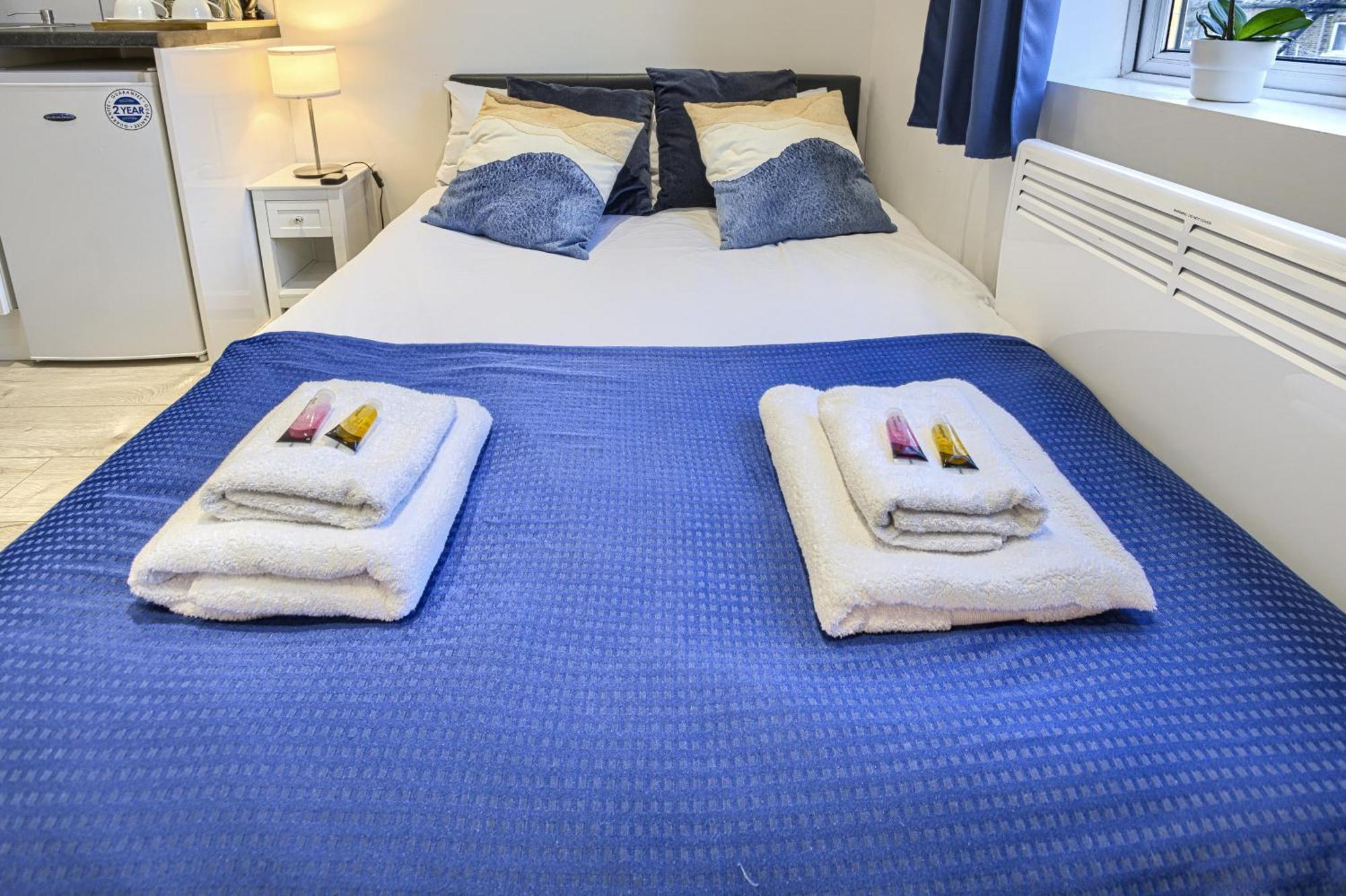 The Finsbury Deluxe Apartments London Szoba fotó
